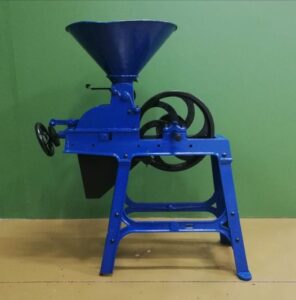 Milling machine fully restored and painted bright blue on display at Sligo Folk Park, Riverstown