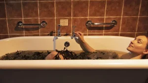 girl sitting in voya seaweed bath